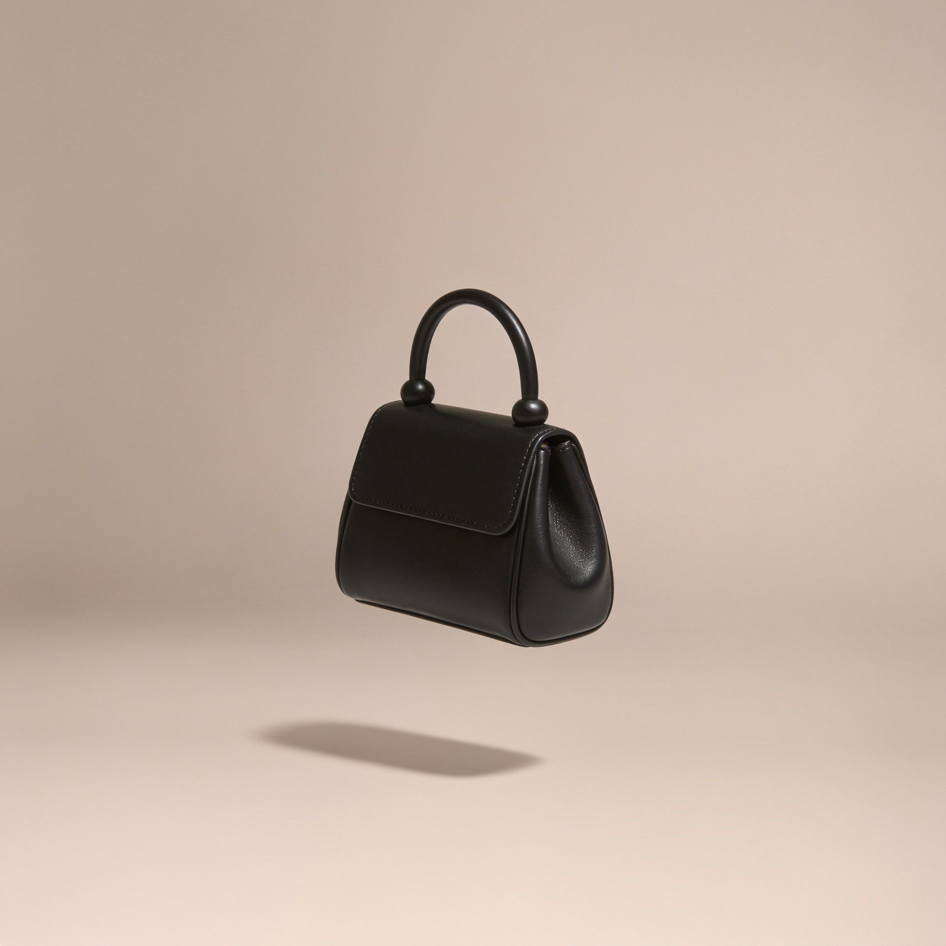 The Top-Handle Bag in black leather