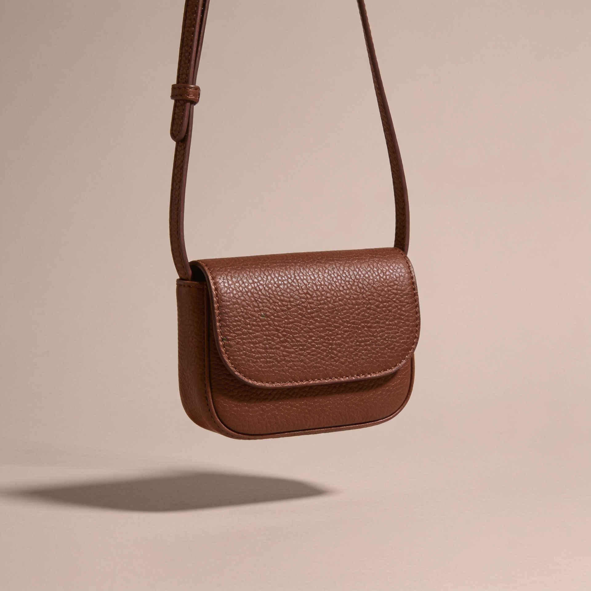 The Mini Crossbody in chocolate leather