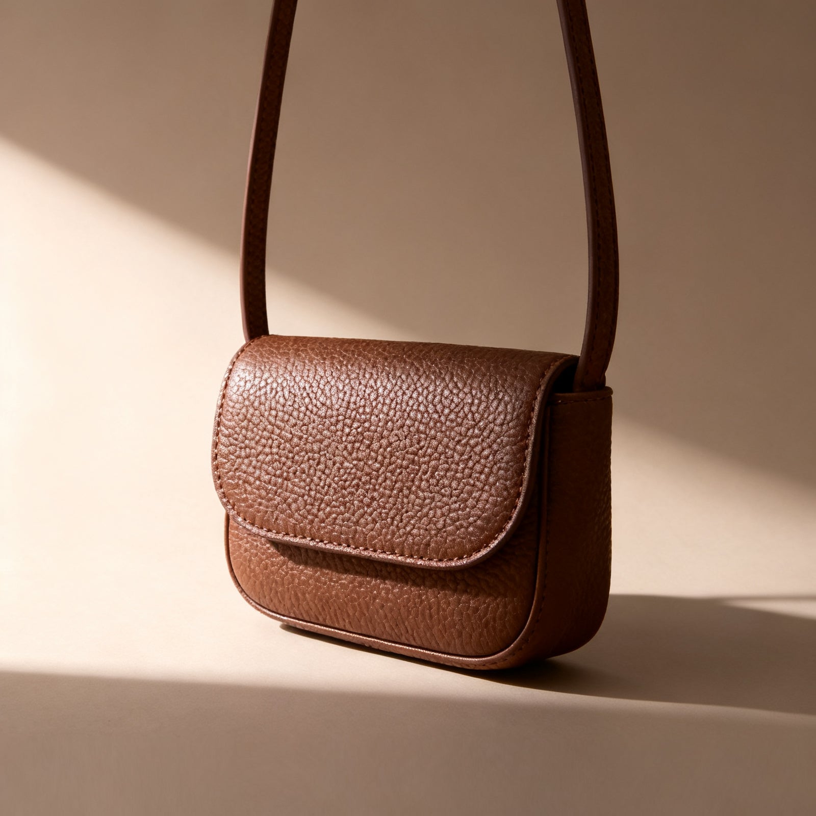 The Mini Crossbody, three-quarter view