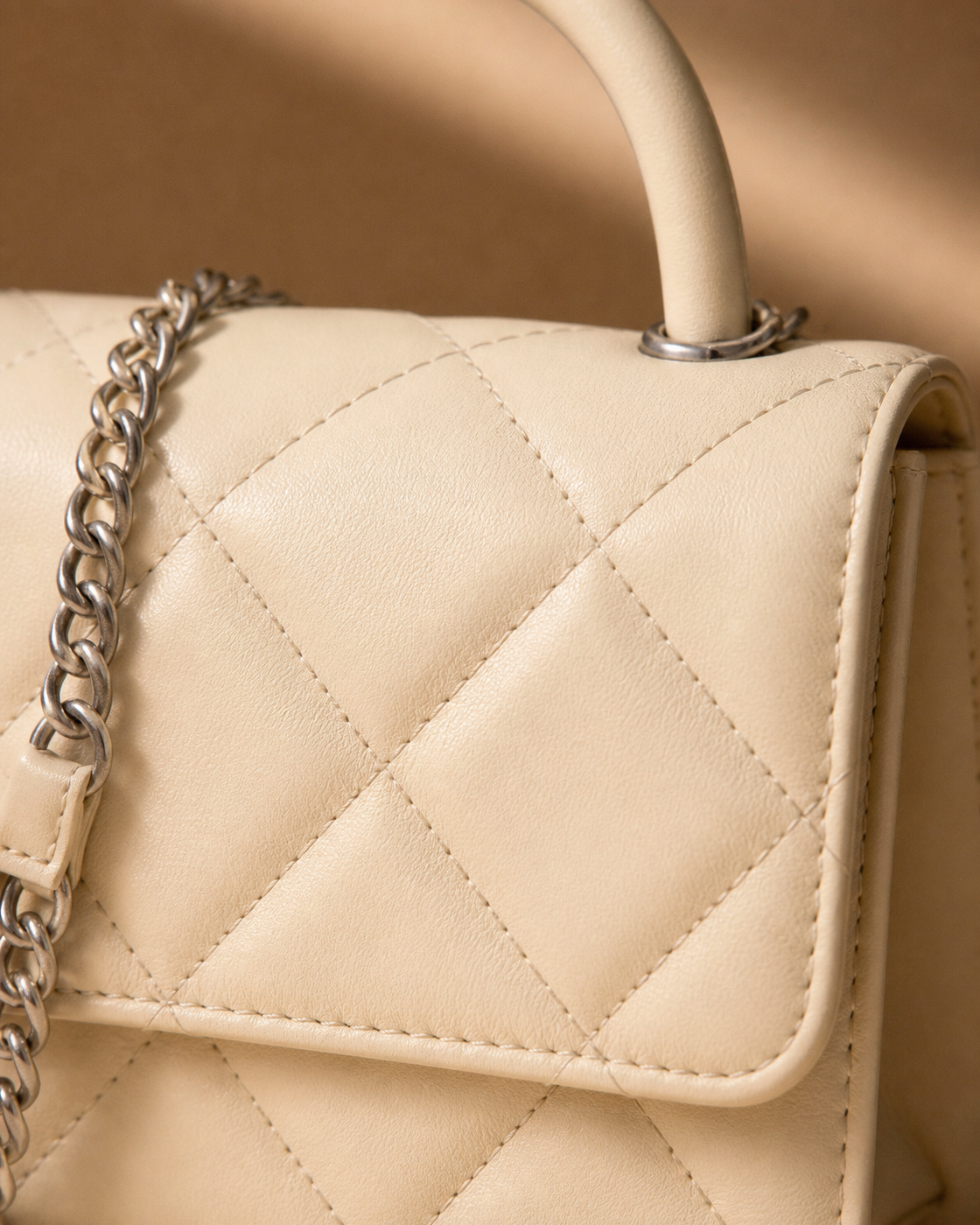 Saint Loir Quilted Top-Handle Bag — detail view
