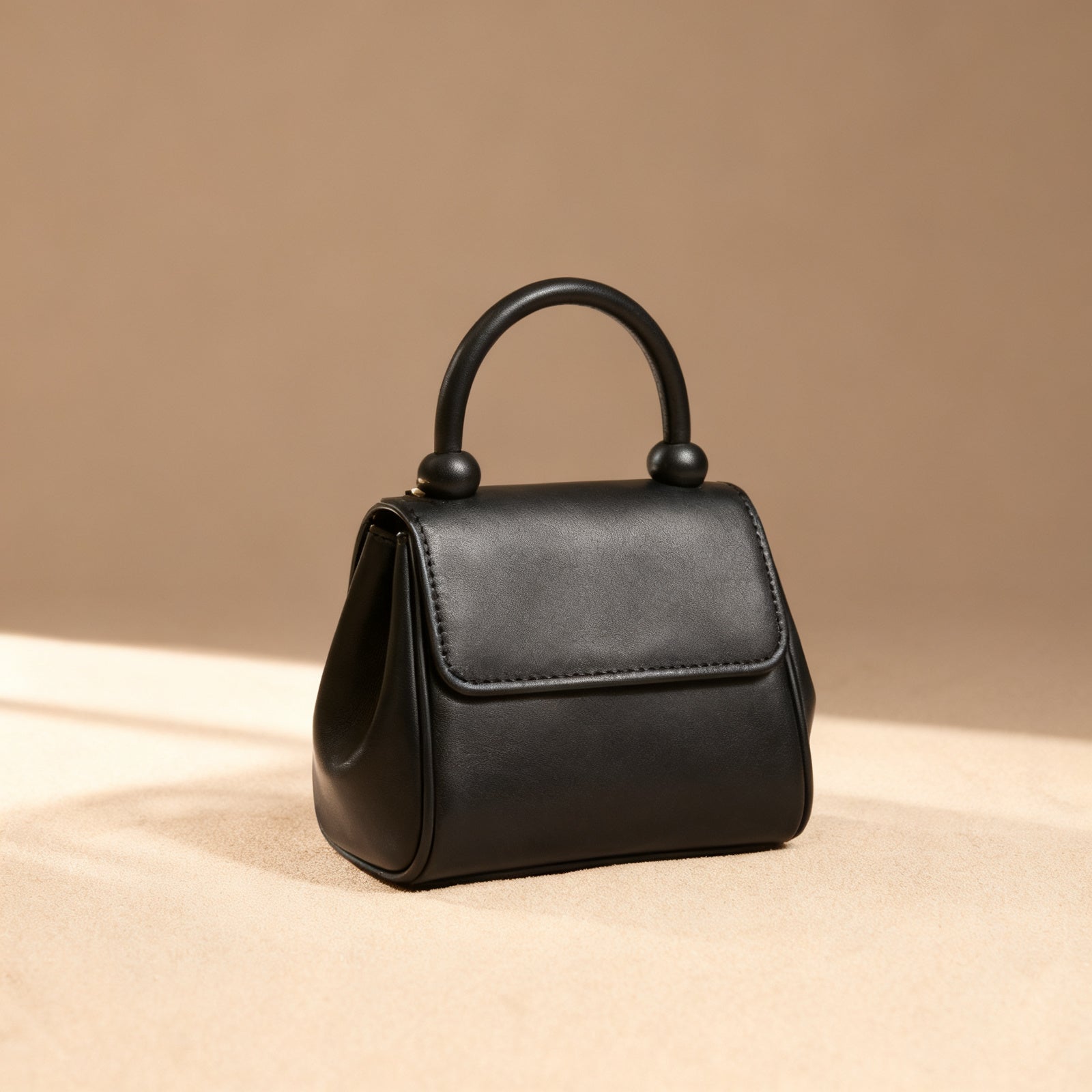 The Top-Handle Bag, three-quarter view
