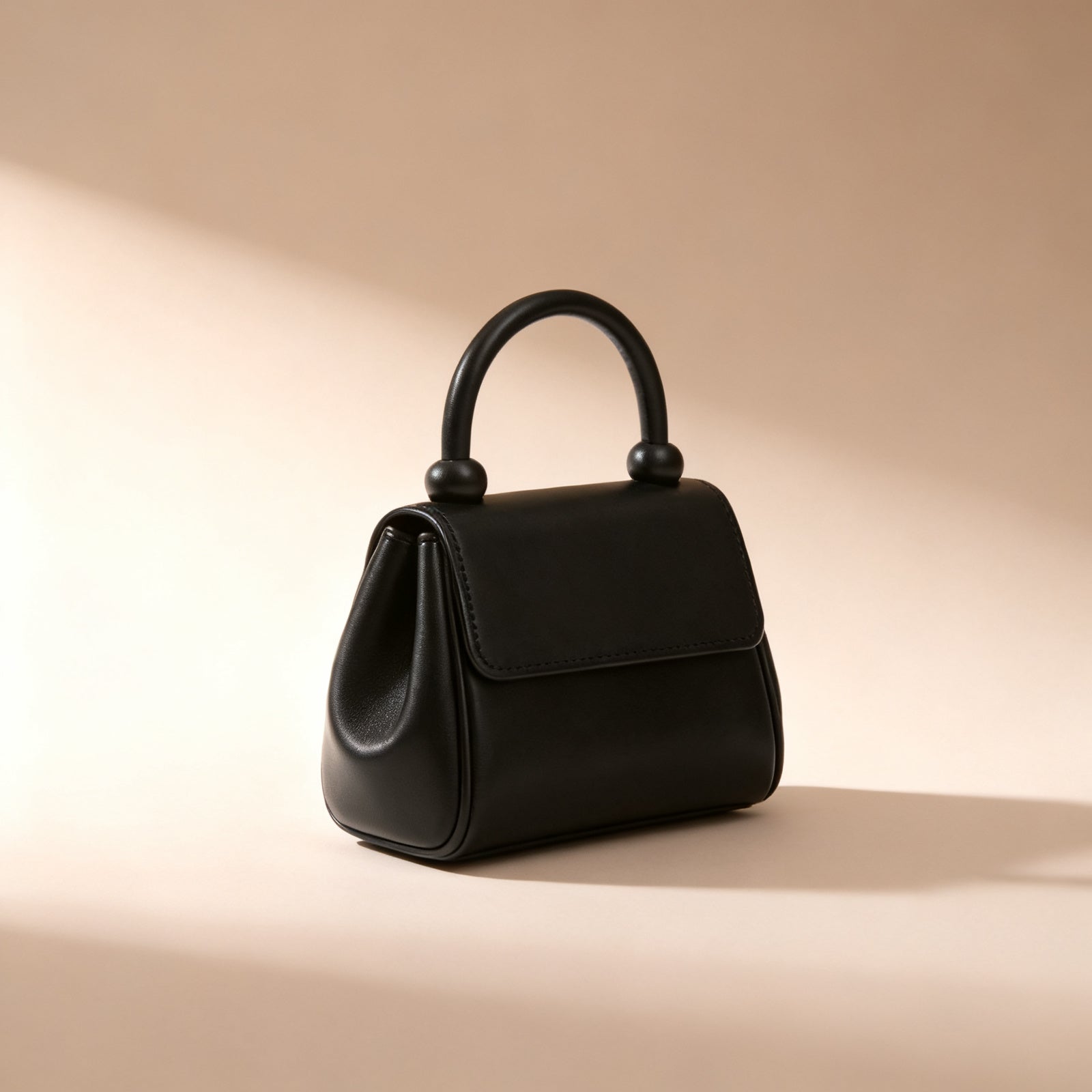 The Top-Handle Bag, side view