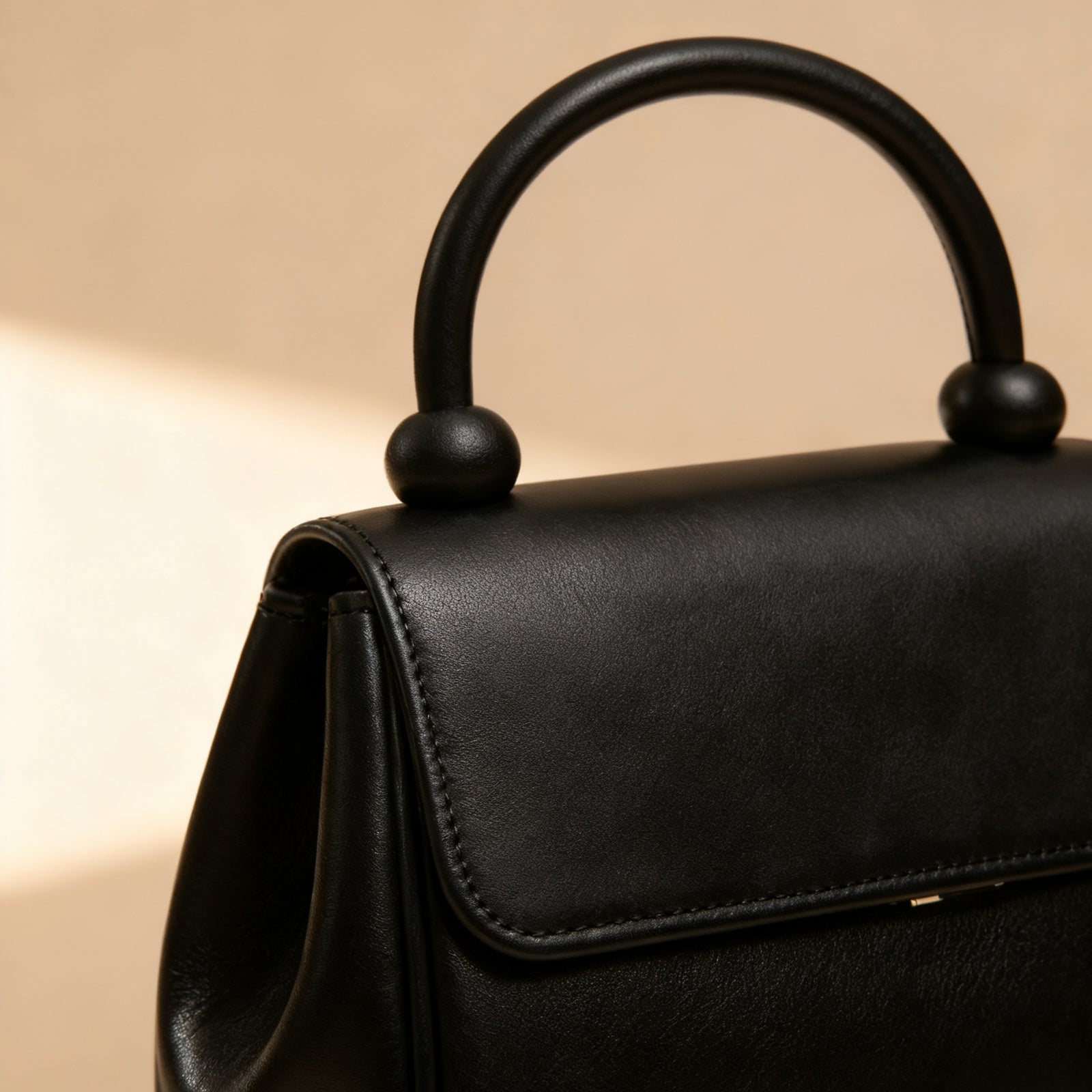 The Top-Handle Bag, exterior detail